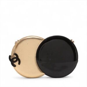 Chanel gold and black circle clutch